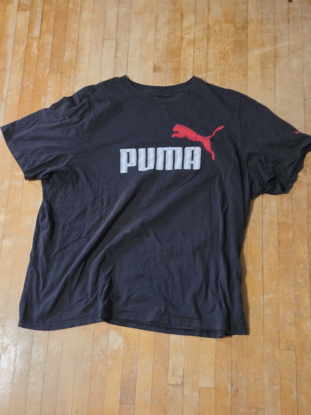 Puma Men's Black Graphic Logo T-Shirt with Red Puma Icon